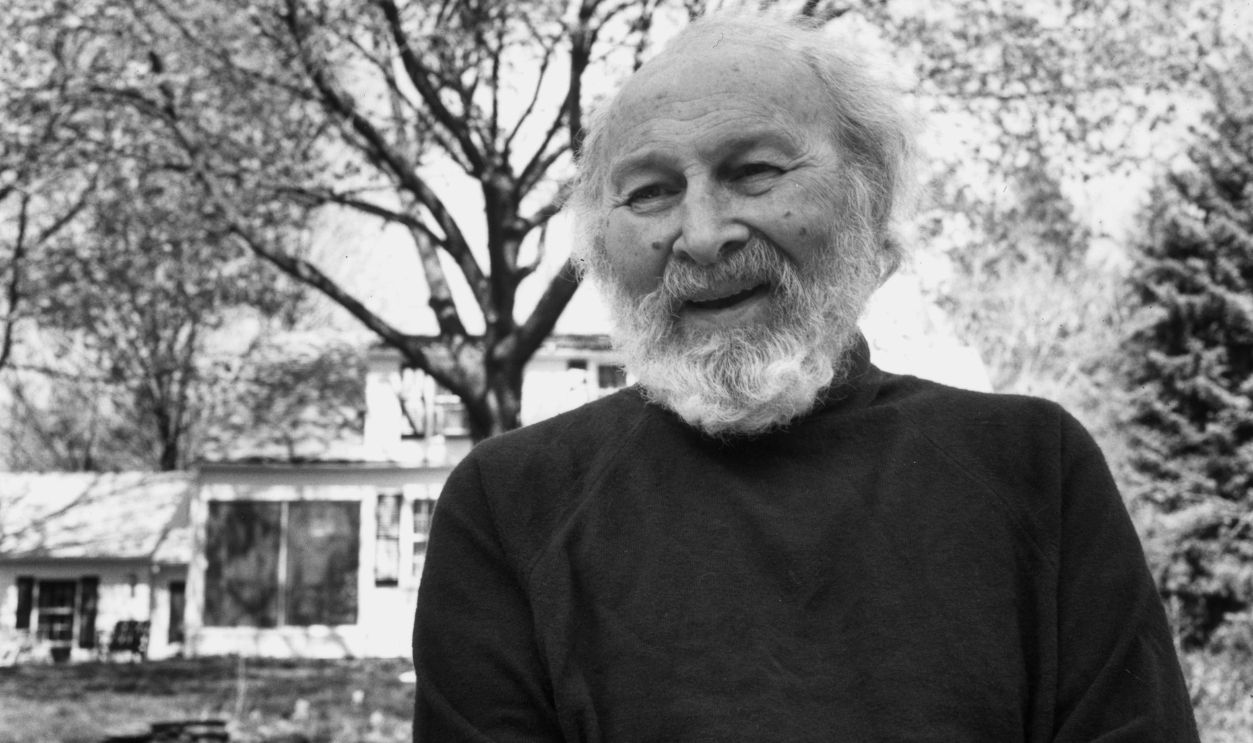 American actor Morris Carnovsky (1897 - 1992) smiles while standing in a yard.