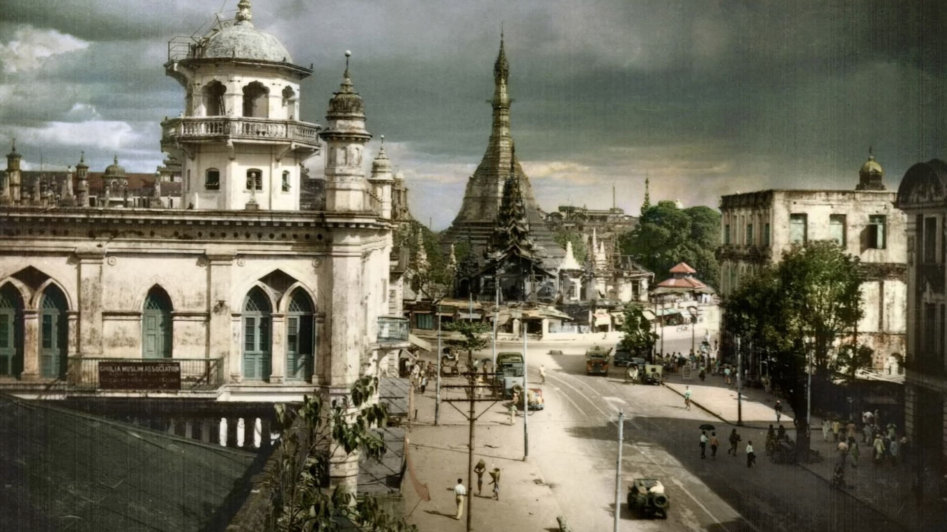 Late 1930s - Early 1940s British Burma (Myanmar), Rangoon, (Yangon).
Pre-WW2 view of Rangoon and the Sule Pagoda.
On 7th March 1942, the British Allied forces evacuated Rangoon after implementing a scorched earth plan to deny the Japanese the use of its facilities.
The port was destroyed and the oil terminal was blown up.
As the Allies departed, the city was on fire.
The Japanese Empire took control of the city shortly after.
Vintage Postcard.

Restored Image..