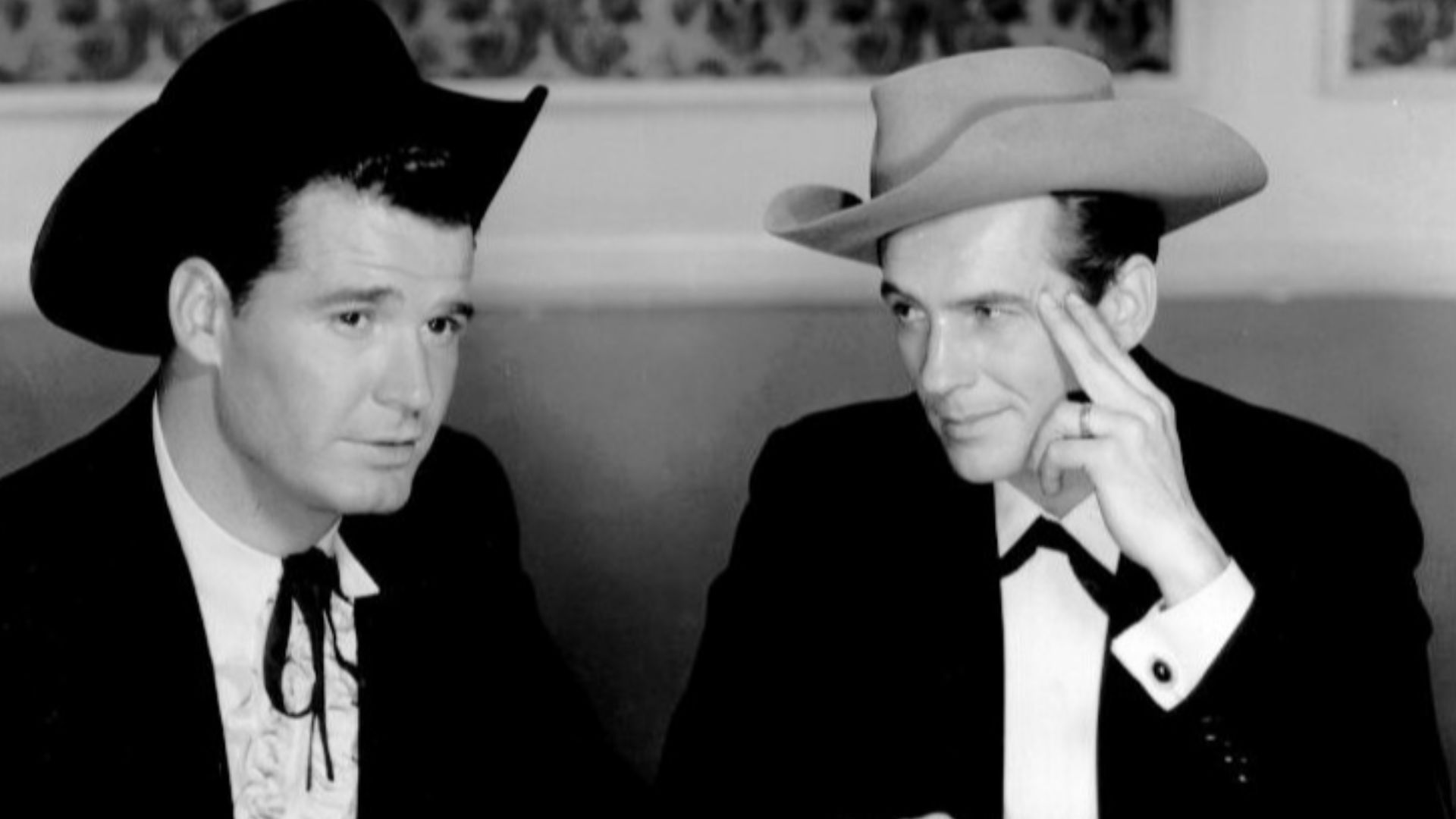 Photo of James Garner as Bret Maverick and Jack Kelly as Bart Maverick.  The episode, titled