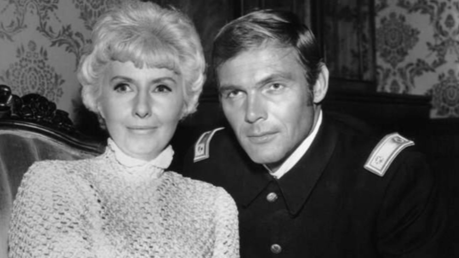 Photo of Barbara Stanwyck as Victoria Barkley and guest star Adam West as Major Jonathan Elliot from the television program The Big Valley.  The episode is
