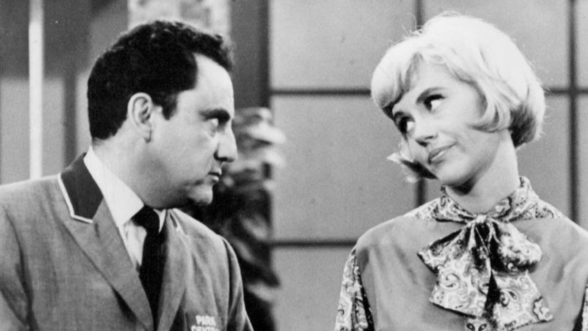 Photo of Bill Dana as Jose Jimenez and Maggie Peterson (aka Maggie Mancuso) as Susie, the coffee shop lady at the hotel, from the television program The Bill Dana Show.