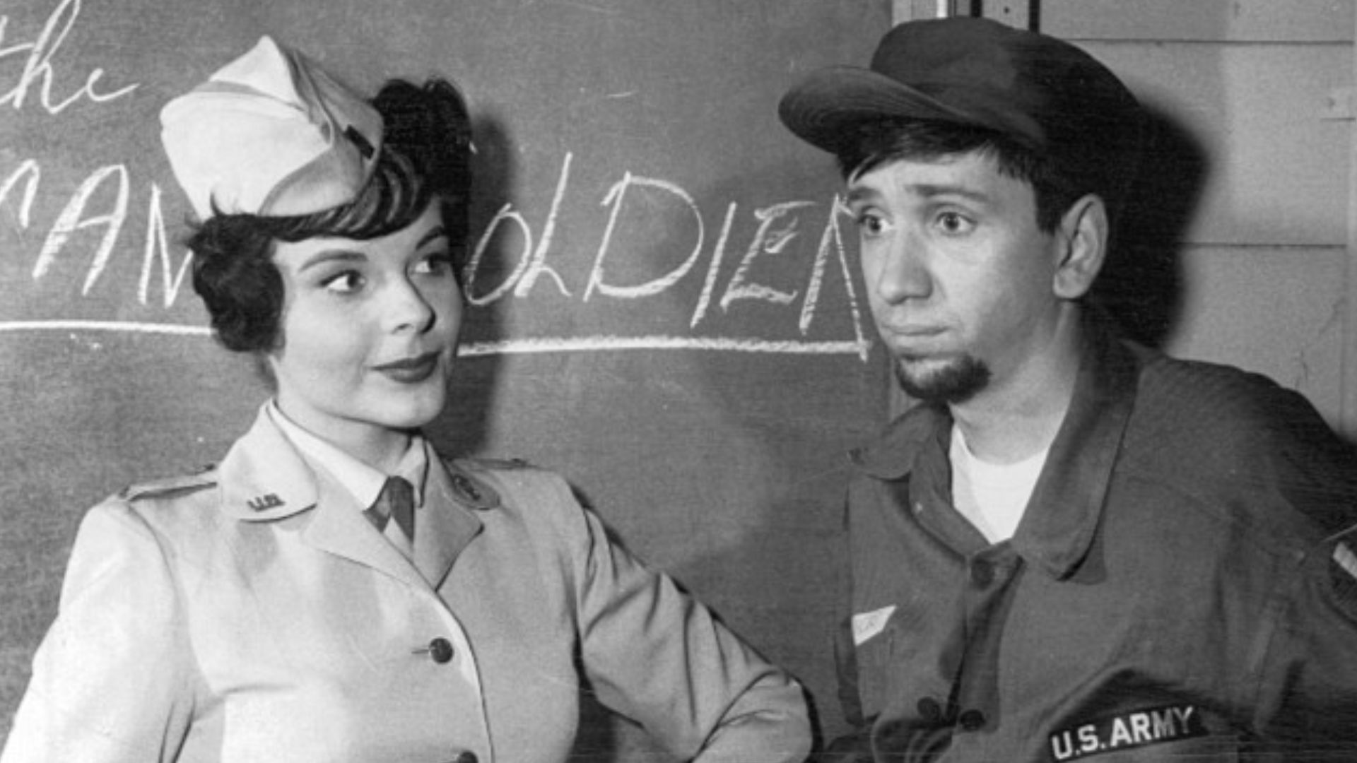 Photo of Bob Denver as Maynard G. Krebs and Kaye Elhardt from the comedy television series The Many Loves of Dobie Gillis.  Maynard was not prepared to lose his beard when he joined the Army.