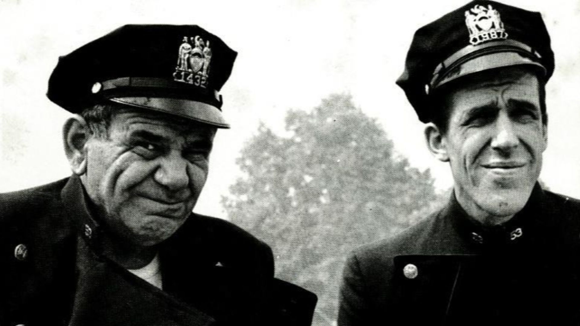 Fan response photo postcard of Joe E. Ross as Gunther Toody and Fred Gwynne as Francis Muldoon from the television program Car 54, Where Are You? The preprinted card was used to respond to fan mail and also to promote the television show.