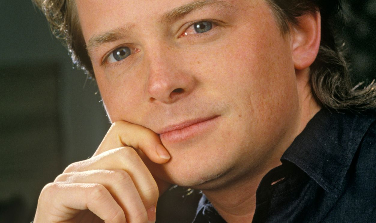 Actor Michael J. Fox Portrait Session BEVERLY HILLS, CA - 1988: Actor Michael J. Fox poses during a 1988 Beverly Hills, California, photo portrait session. Fox, a three-time Emmy Award for his work on TV's "Family Ties," also starred in the "Back to the Future" film trilogy.
