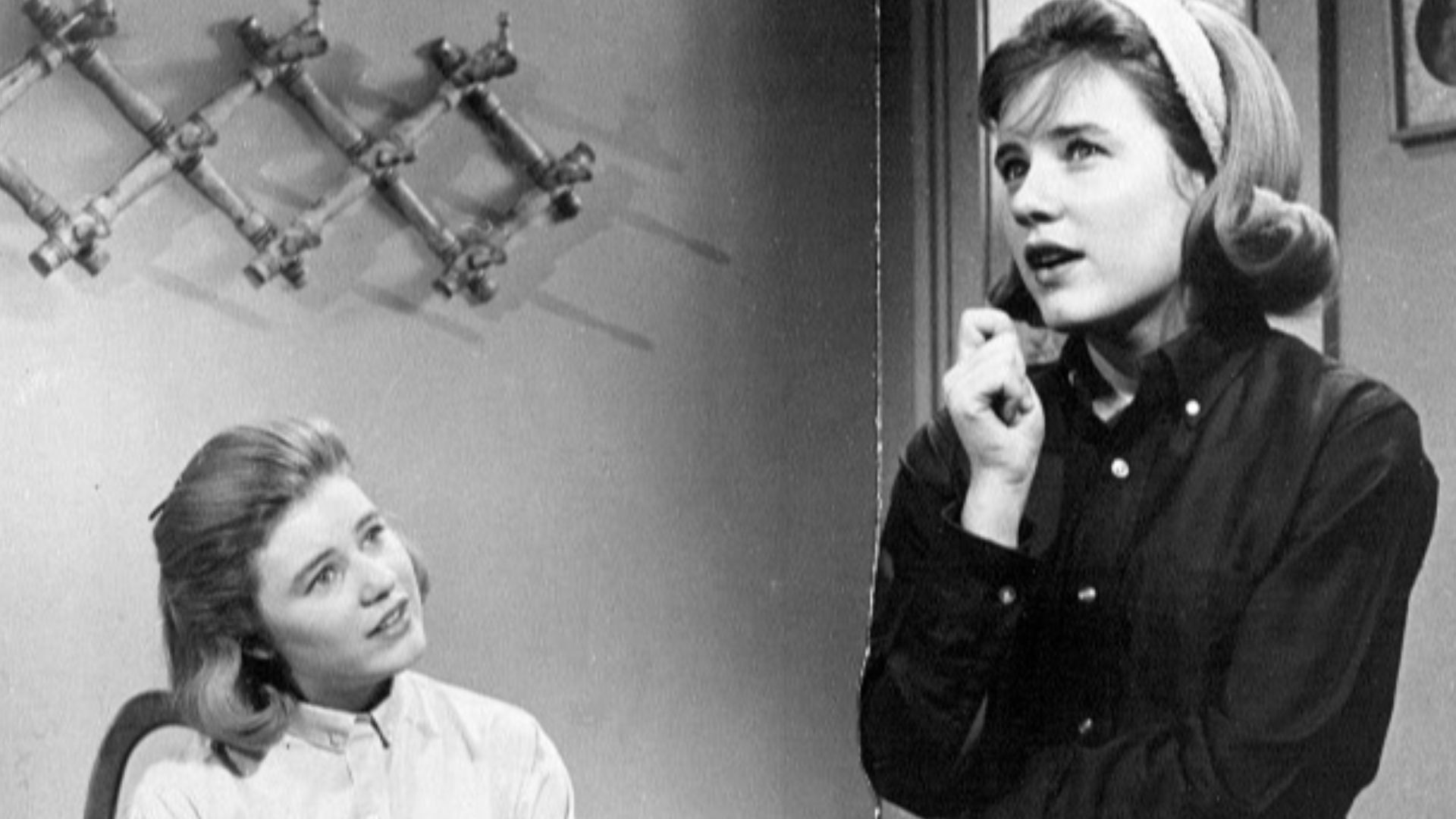Photo of Patty Duke in a dual role of identical cousins from The Patty Duke Show.