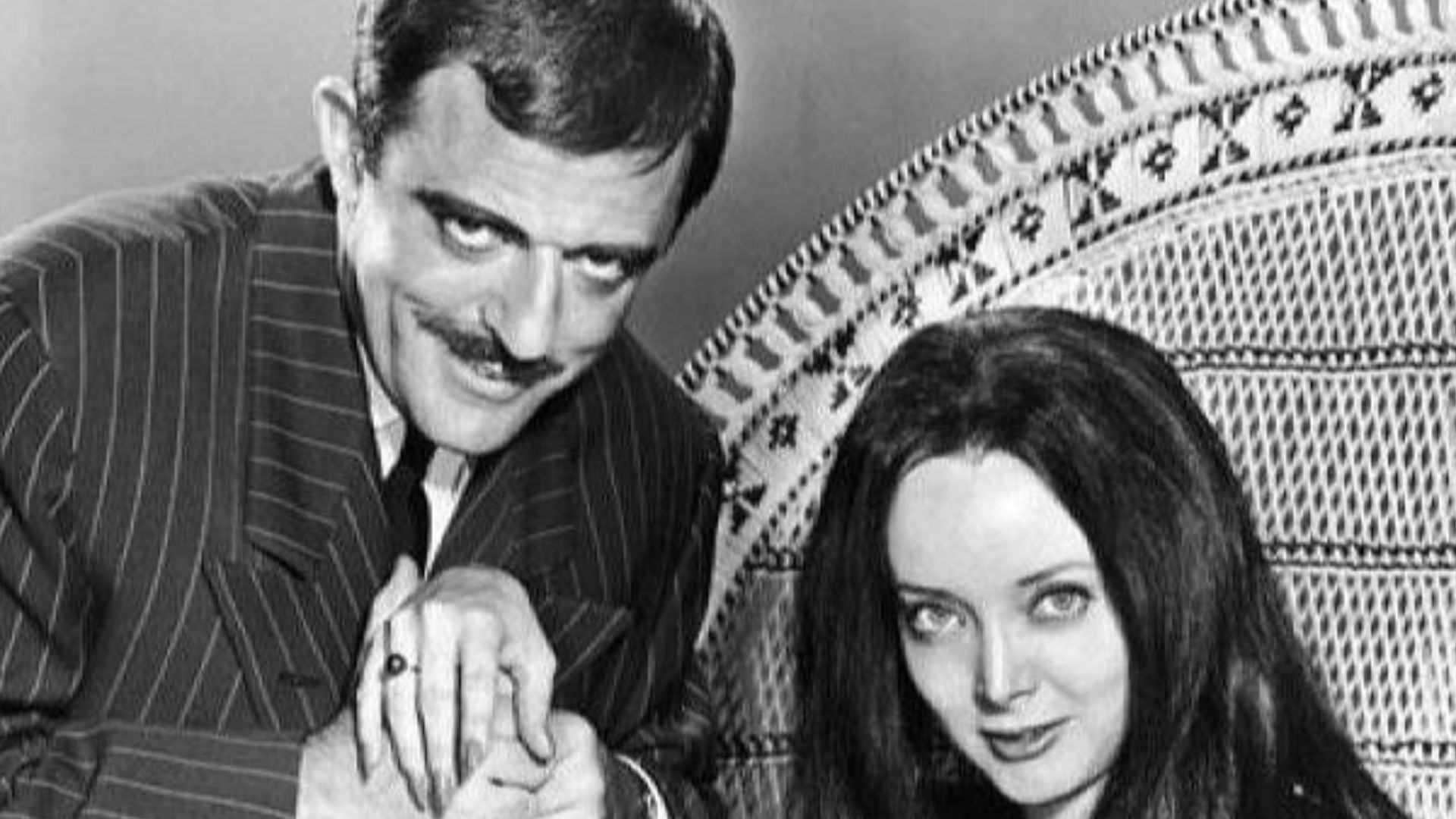 Photo of John Astin and Carolyn Jones as Gomez and Morticia Addams from The Addams Family.