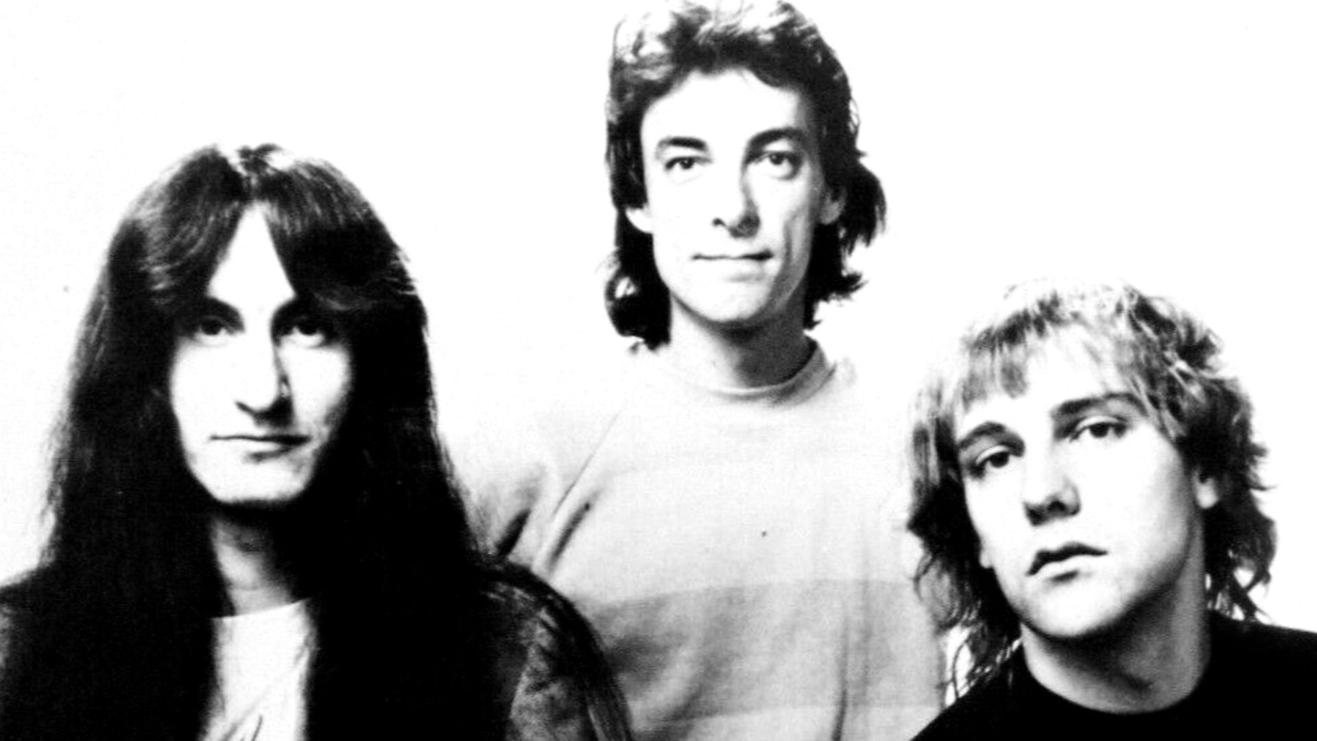 Promotional press photo of Canadian rock band Rush.