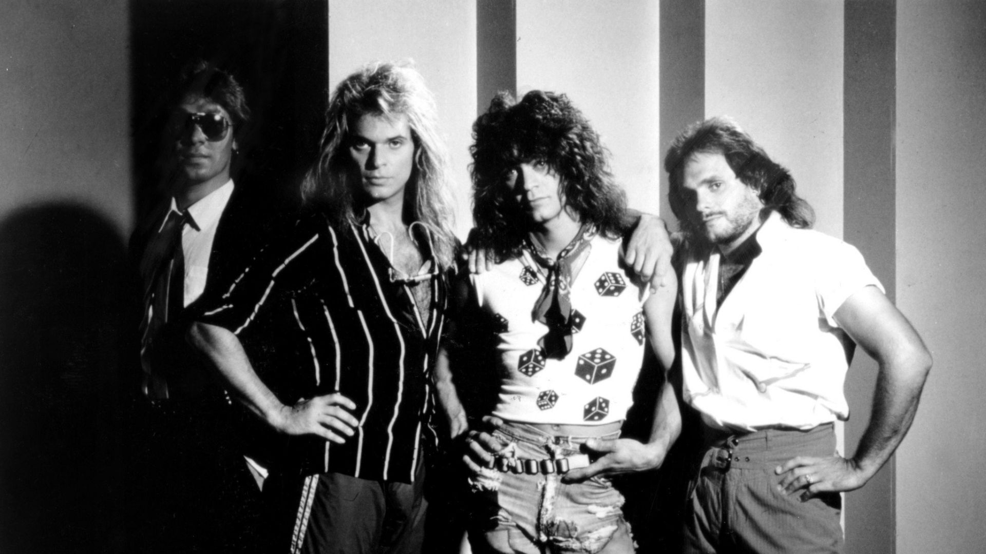Promotional image of rock band Van Halen taken in 1984. From (l-r); Alex Van Halen, David Lee Roth, Eddie Van Halen, and Michael Anthony