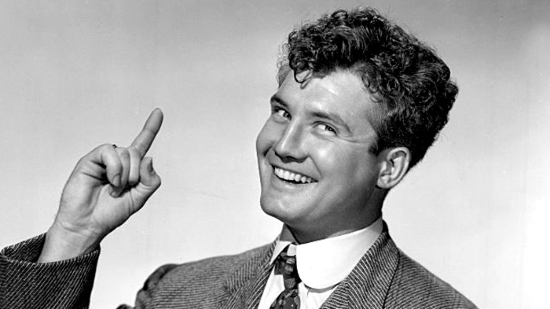 Publicity photo of George Reeves for The Sainted Sisters