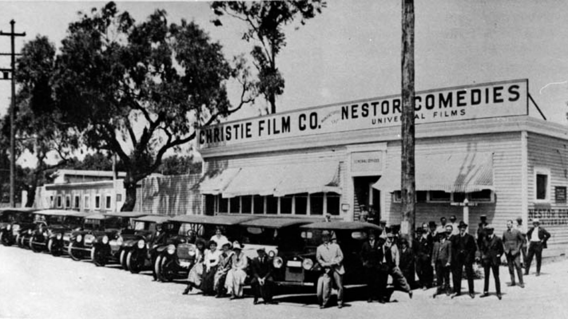 Nestor Studios. The first motion picture studio in Hollywood was built by David Horseley for Christie Film Co. Automobiles are lined up at Sunset Blvd., with Gower Street at right. The sign above the building reads