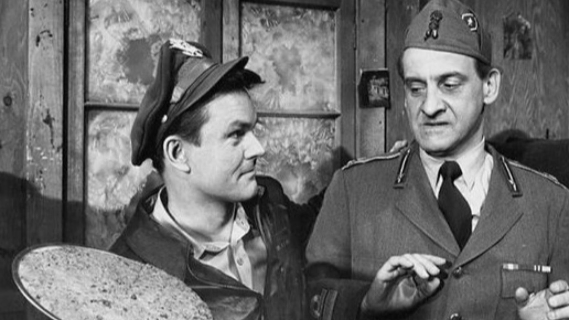 Publicity photo of Bob Crane as Col. Hogan with Hans Conried as a visiting Italian officer from the television show Hogan's Heroes.