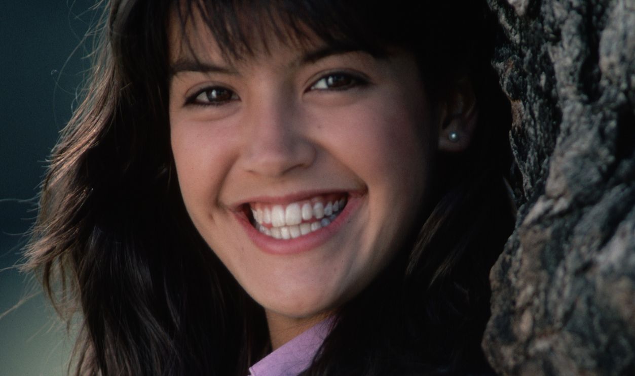 (Original Caption) : Outdoor portrait of actress Phoebe Cates. She is shown in a head-and-shoulders view, leaning against a tree. Photograph, 1982.