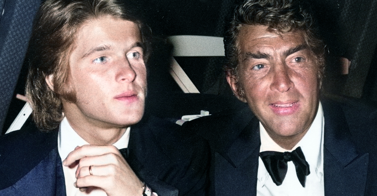 Singer Dean Martin and son Dean-Paul Martin attending the premiere party for 'Airport on March 19, 1970 at the Hollywood Pacific Theater in Hollywood, California.
