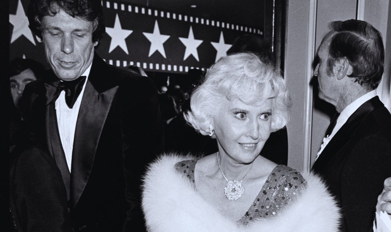 Gettyimages - 1771980893, AFI Tribute to Henry Fonda Barbara Stanwyck (C) attends an American Film Institute event at the Beverly Hilton Hotel in Beverly Hills, California, on March 3, 1978.