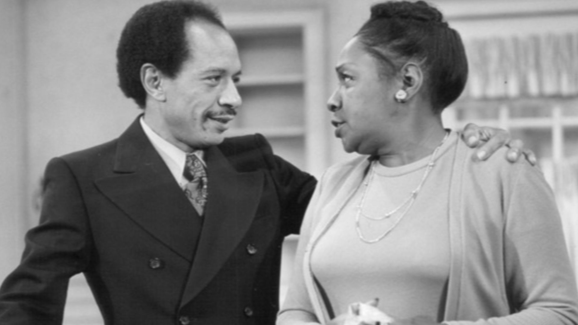 Publicity photo from  All in the Family. Pictured are Sherman Helmsley (George Jefferson) and Isabel Sanford (Louise Jefferson) as they pack to move from Queens to Manhattan. This began the television series The Jeffersons.