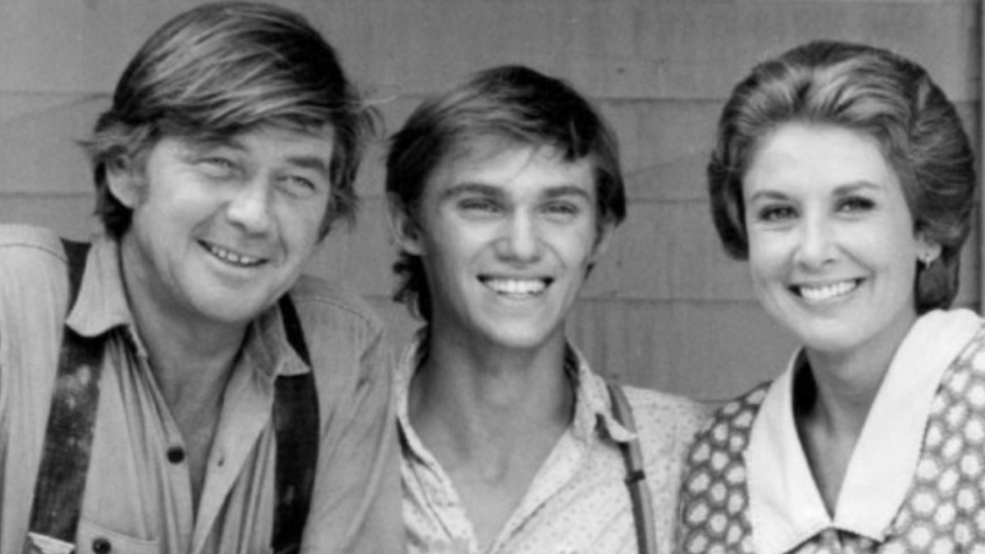 Publicity photo of Ralph Waite (John Walton, Sr.), Richard Thomas (John Boy), and Michael Learned (Olivia Walton) from the television program The Waltons.