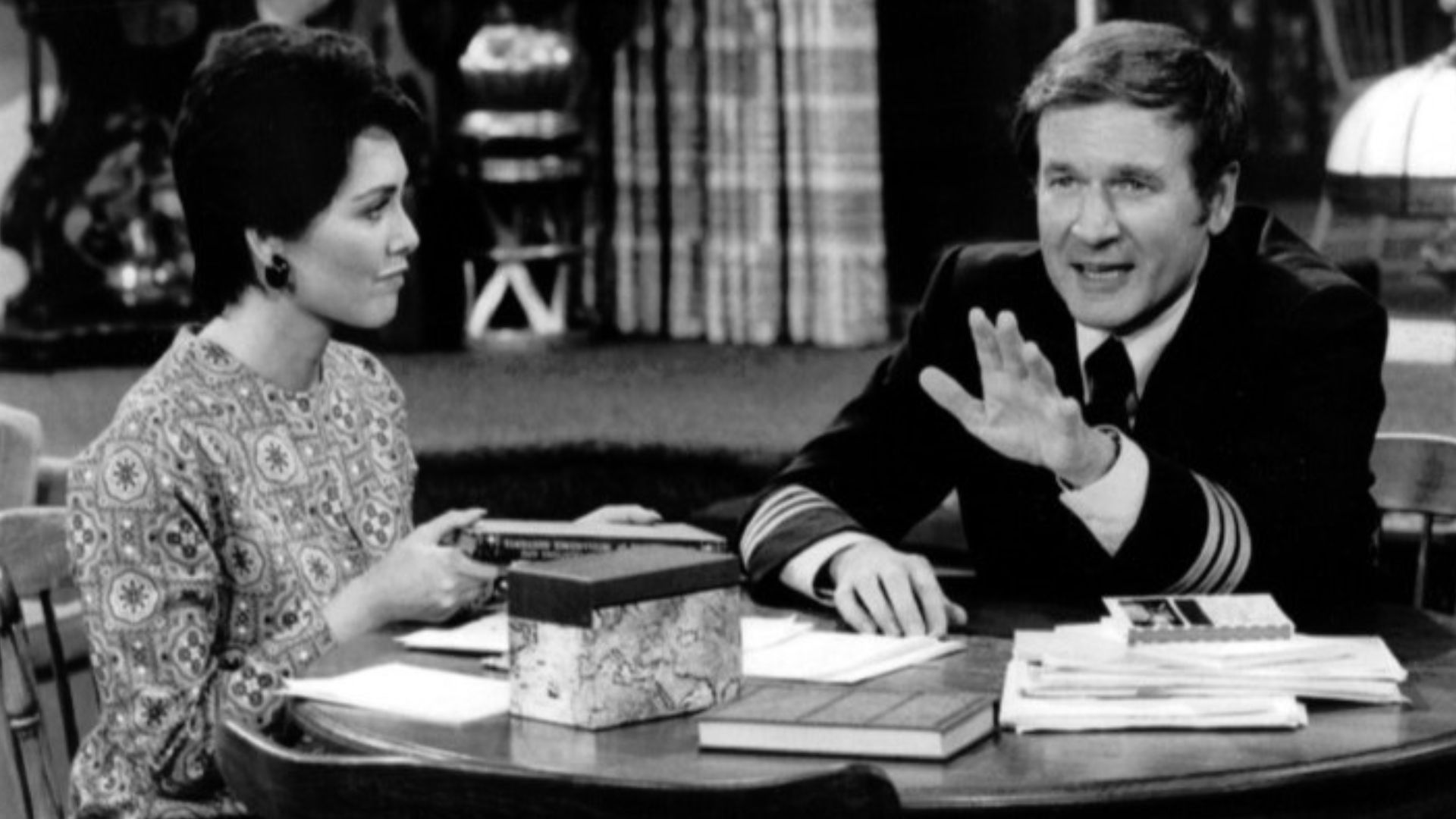 Photo from the television program The Bob Newhart Show.  Emily (Suzanne Pleshette) listens to Howard (Bill Daily).