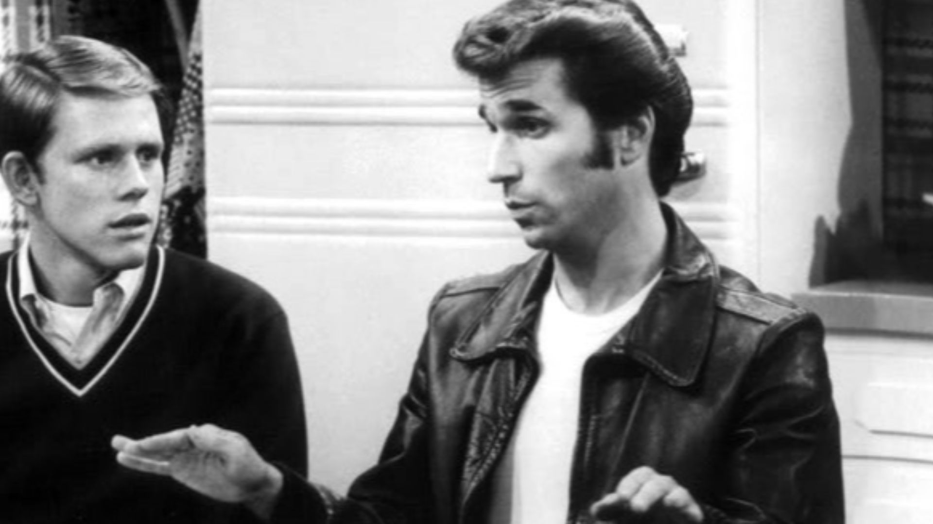 Photo of Richie (Ron Howard) and Fonzie (Henry Winkler) in the Cunningham kitchen from the televiion program Happy Days.