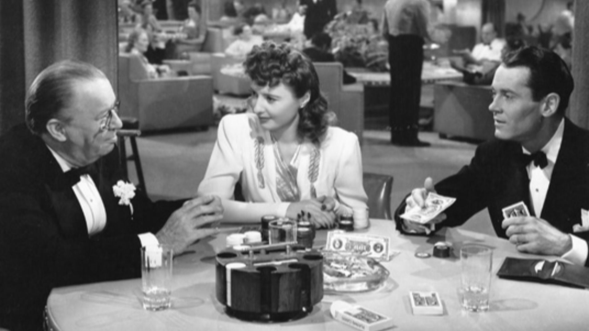 Promotional still from the 1941 film The Lady Eve, published in National Board of Review Magazine. L-R: Charles Coburn, Barbara Stanwyck, Henry Fonda