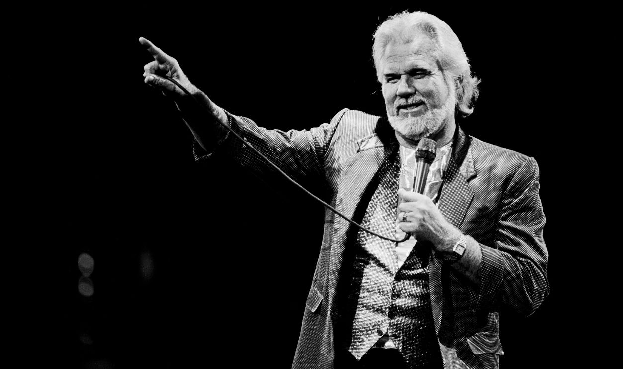American Country musician Kenny Rogers (1938 - 2020) performs onstage at Brendan Byrne Arena (later Meadowlands Arena), East Rutherford, New Jersey, October 20, 1988.