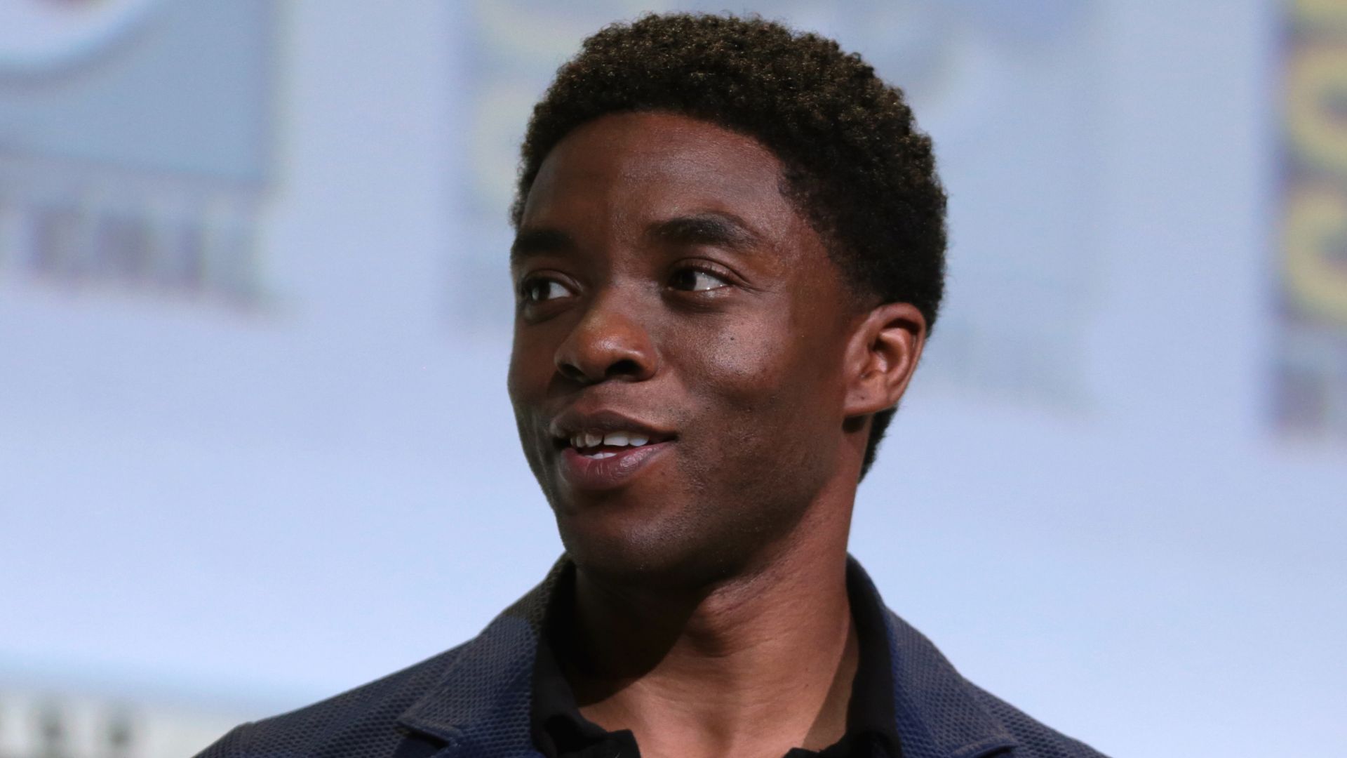 Chadwick Boseman speaking at the 2016 San Diego Comic-Con International in San Diego, California.