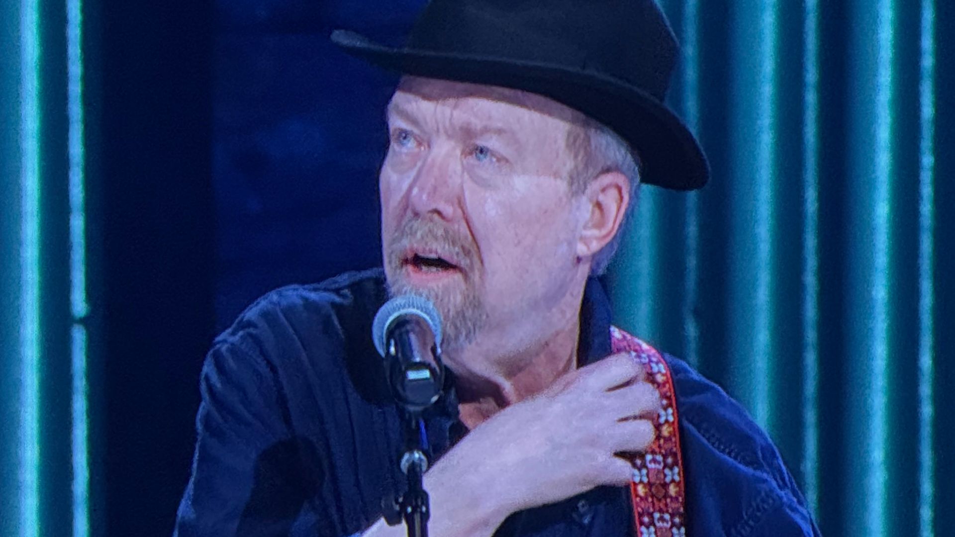 Photo of Don Schlitz performing at the Grand Ole Opry on April 4, 2025