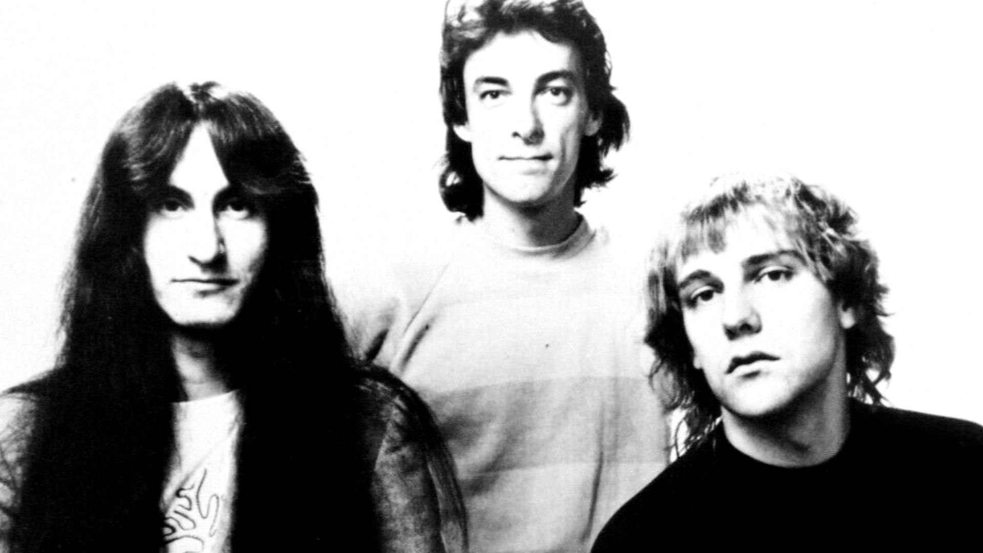 Promotional press photo of Canadian rock band Rush.