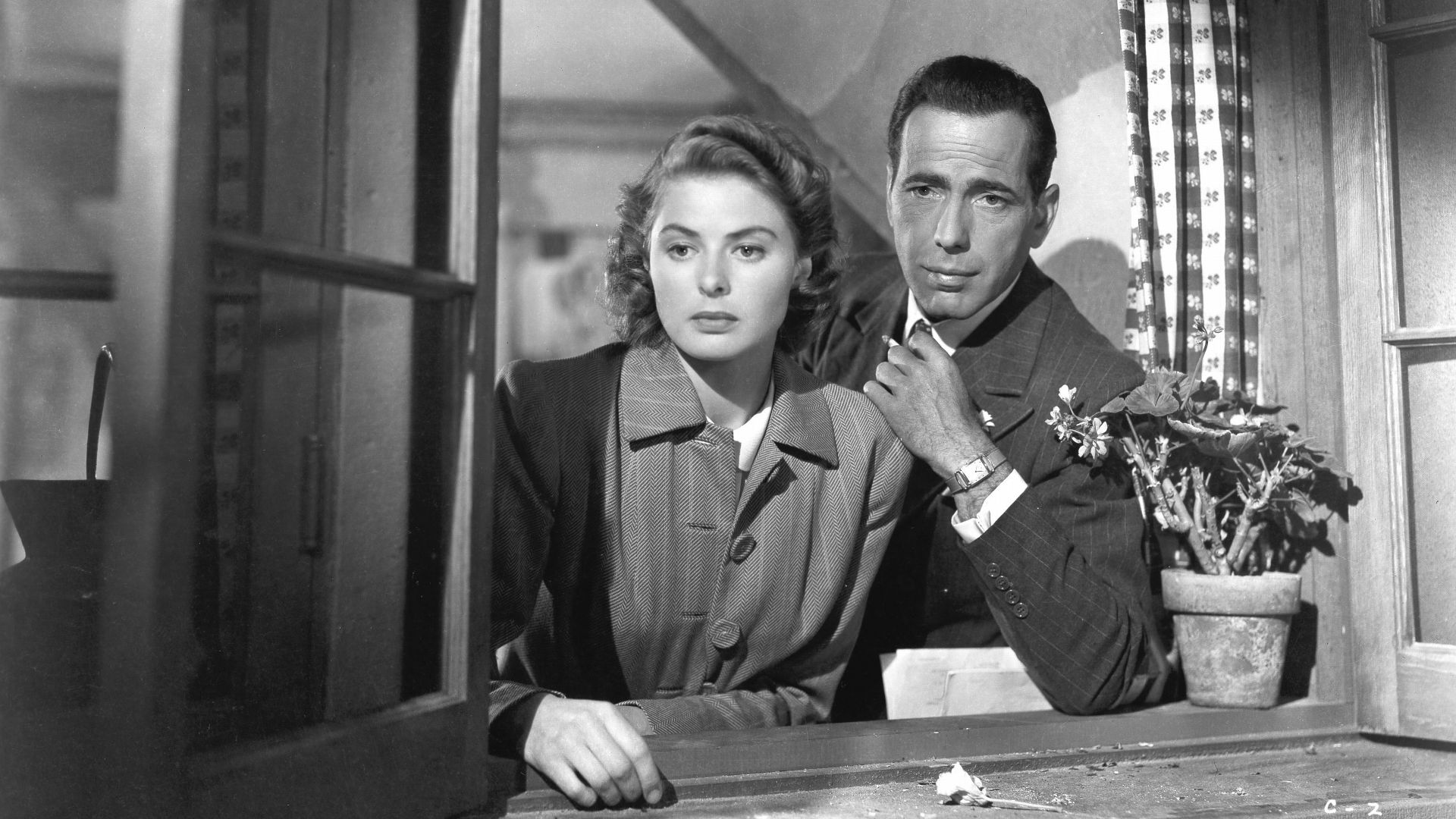 Ingrid Bergman and Humphrey Bogart in the American romantic drama film Casablanca (1942). See also film still. No copyright notice.