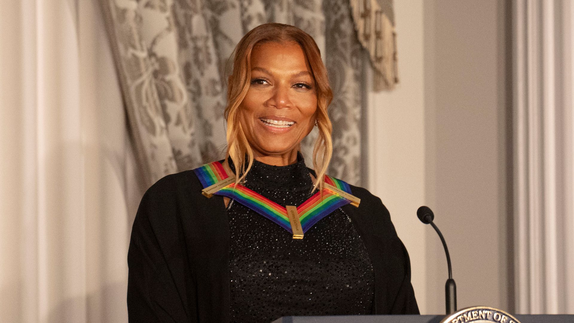 Honoree Queen Latifah speaks at the Kennedy Center Honors dinner at the State Department in Washington, D.C., Saturday, December 2, 2023. (Official State Department photo by Freddie Everett)