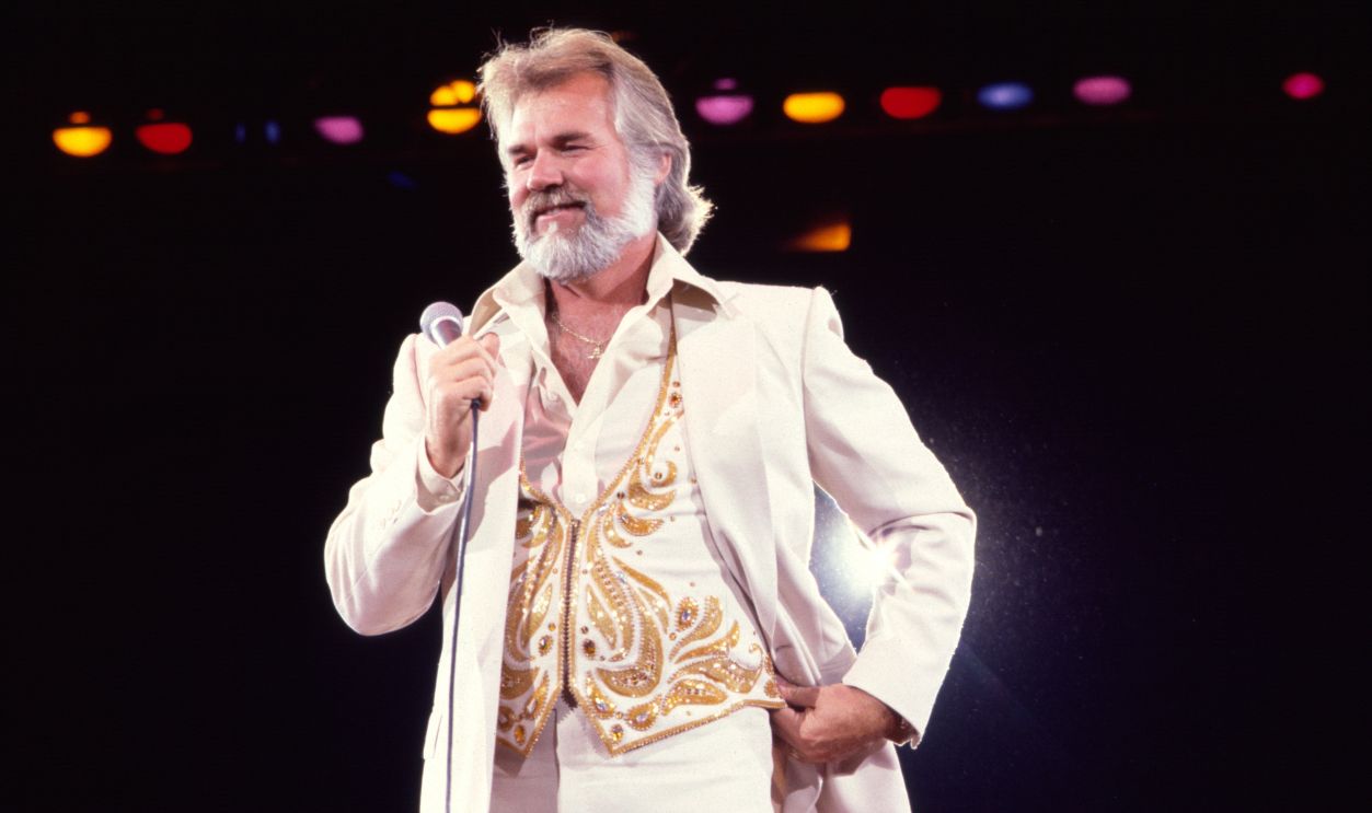 American Country musician Kenny Rogers (1938 - 2020) performs onstage at Nassau Coliseum, Uniondale, New York, September 26, 1980.