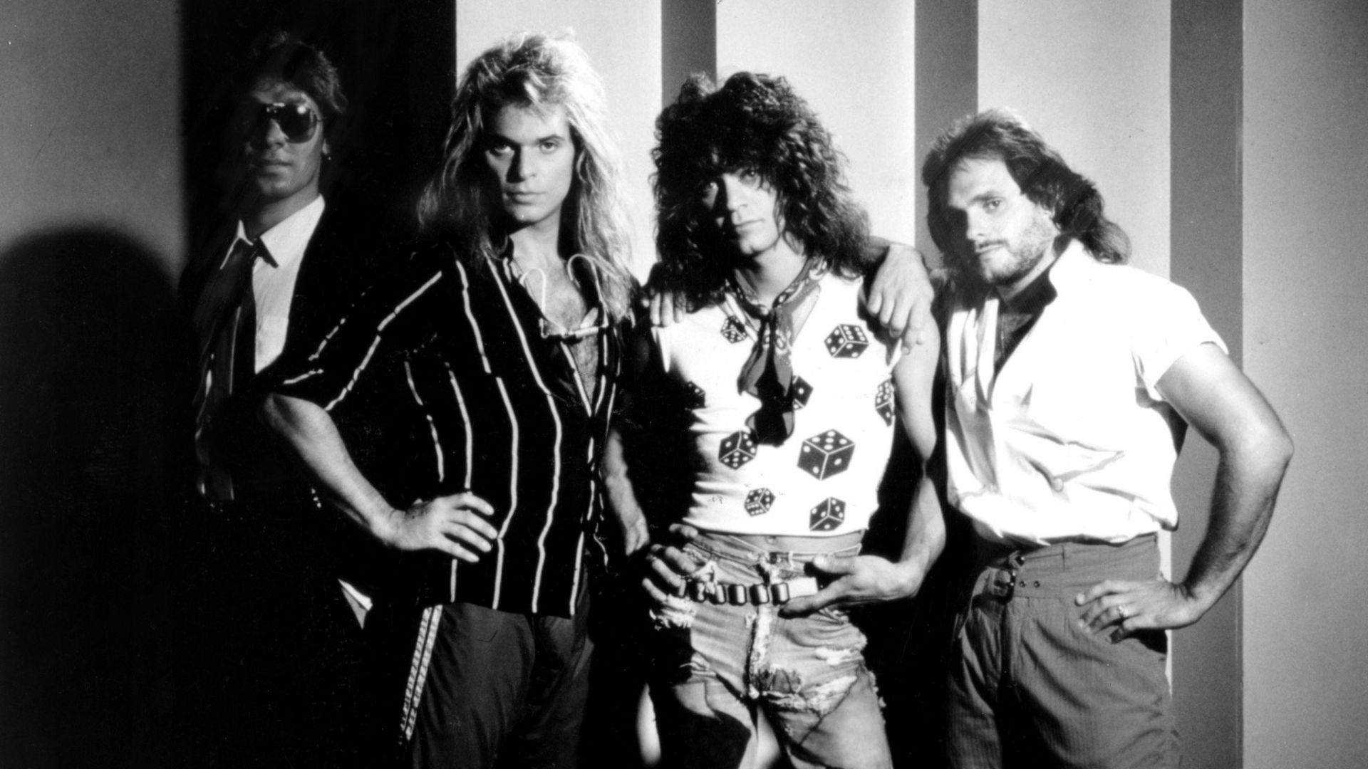 Promotional image of rock band Van Halen taken in 1984. From (l-r); Alex Van Halen, David Lee Roth, Eddie Van Halen, and Michael Anthony