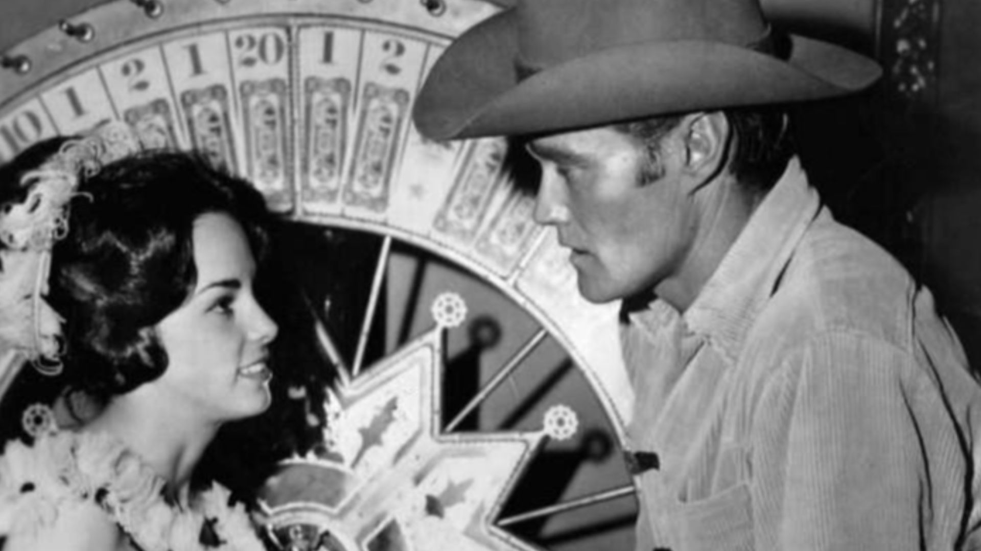 Photo of Chuck Connors as Lucas McCain and guest star Beverly Englander from the television program The Rifleman.
