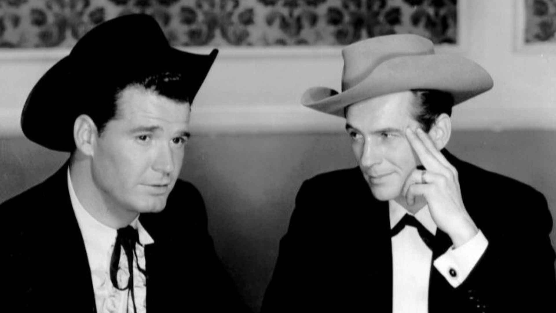 Photo of James Garner as Bret Maverick and Jack Kelly as Bart Maverick.  The episode, titled