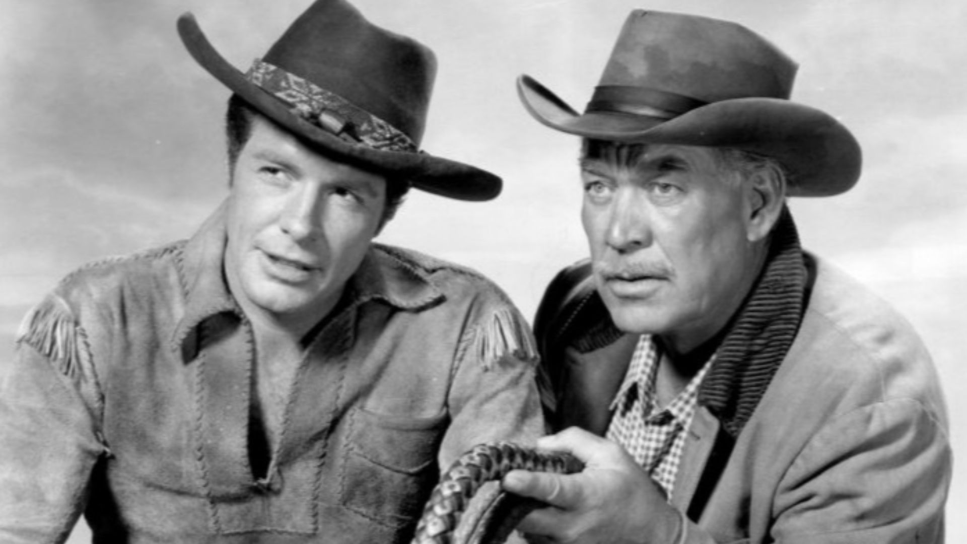 Photo of Robert Horton as Flint McCullough and Ward Bond as Seth Adams from the television program Wagon Train.  McCullough's role was that of the wagon train's scout while Adams was its wagonmaster.