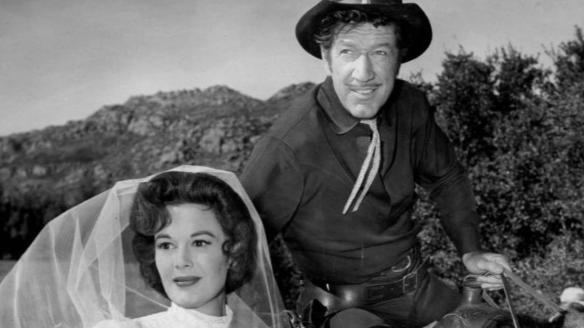 Photo of Richard Boone as Paladin and guest star Patricia Medina from the television program Have Gun, Will Travel.