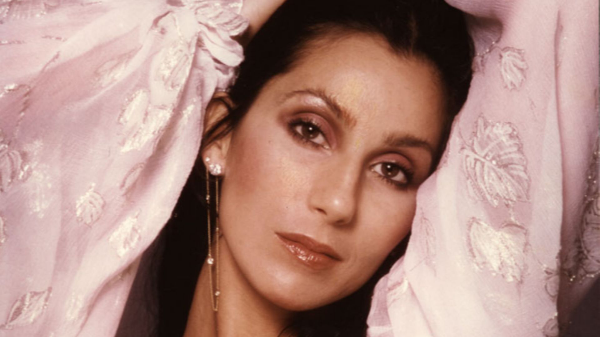 Portrait photo of Cher by Harry Langdon in Los Angeles, 1978. Date and location info from Getty Images listing of other photo from same photoshoot here.