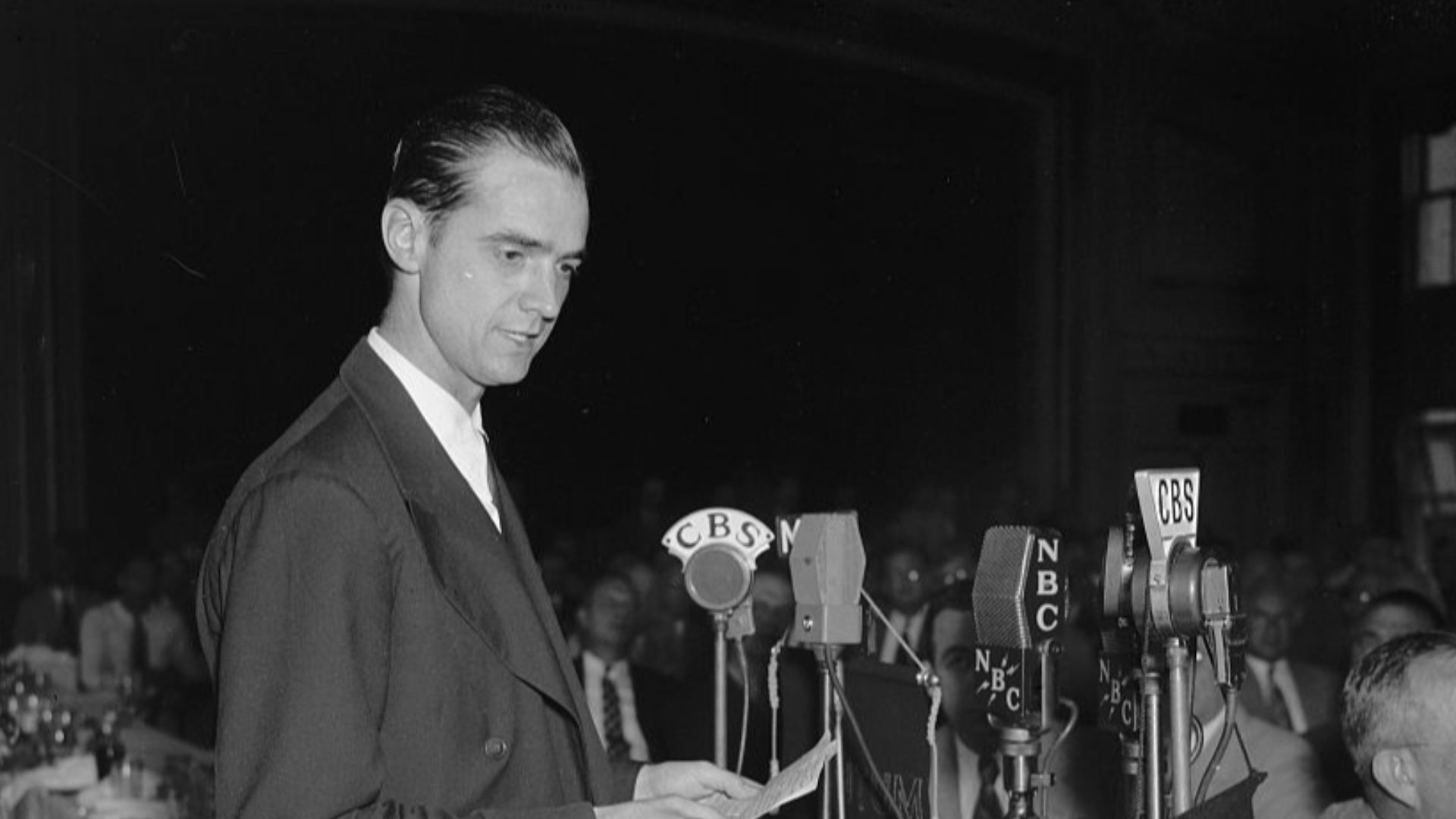 Title: Howard Hughes speaking before the Press Club. Washington, D.C., July 21. Howard Hughes, speaking at the National Press Club today, before hundreds of government officials and representatives of foreign governments. Hughes today envisioned a future 