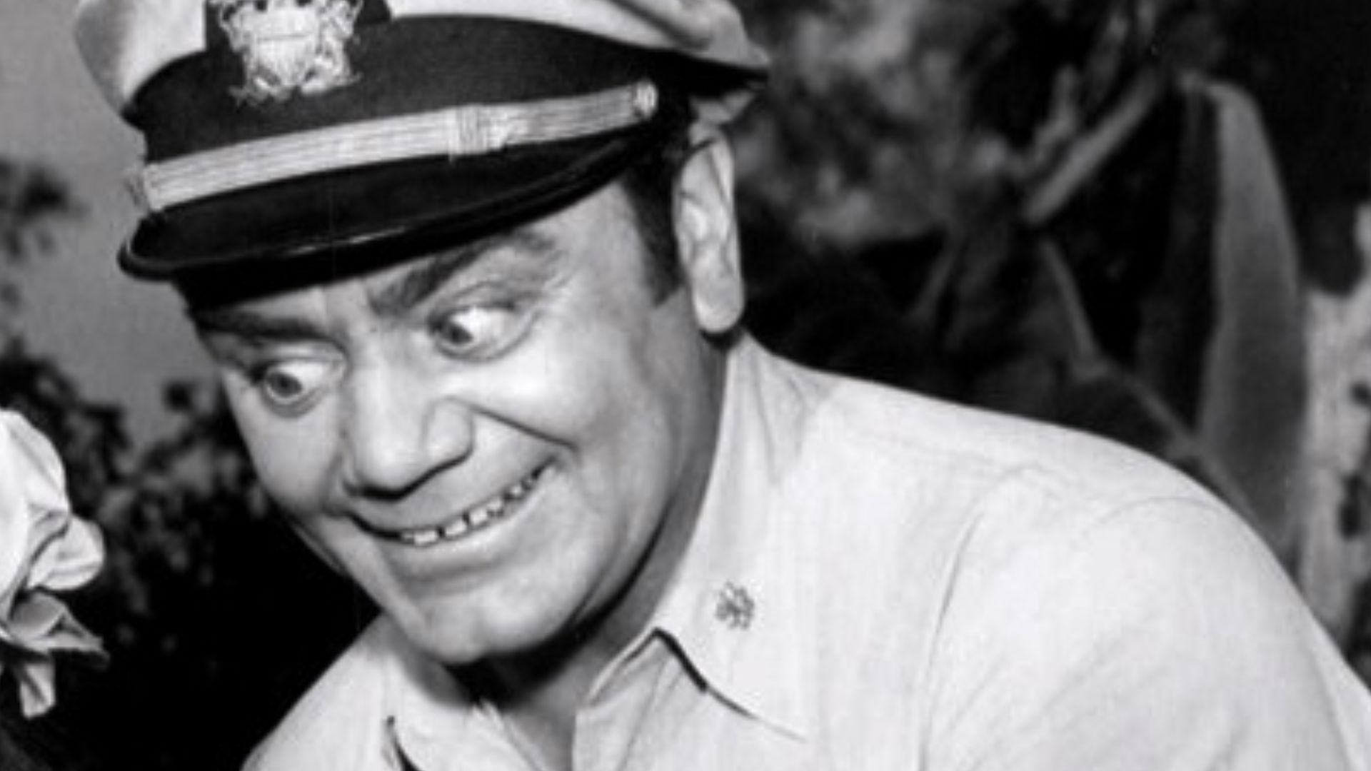 Photo of Ernest Borgnine as McHale and Peggy Mondo as Little Flower, the chief's daughter, from the television program McHale's Navy.