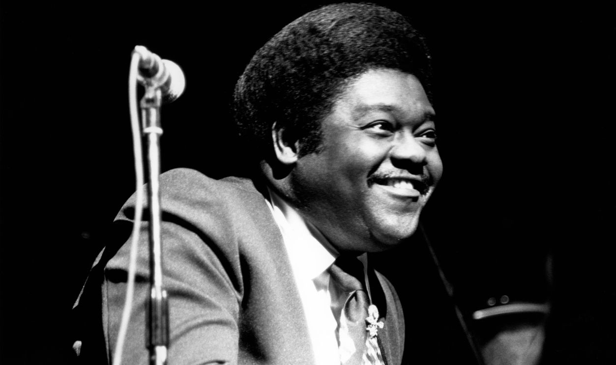 Photo of Fats DOMINO; Fats Domino performing on stage