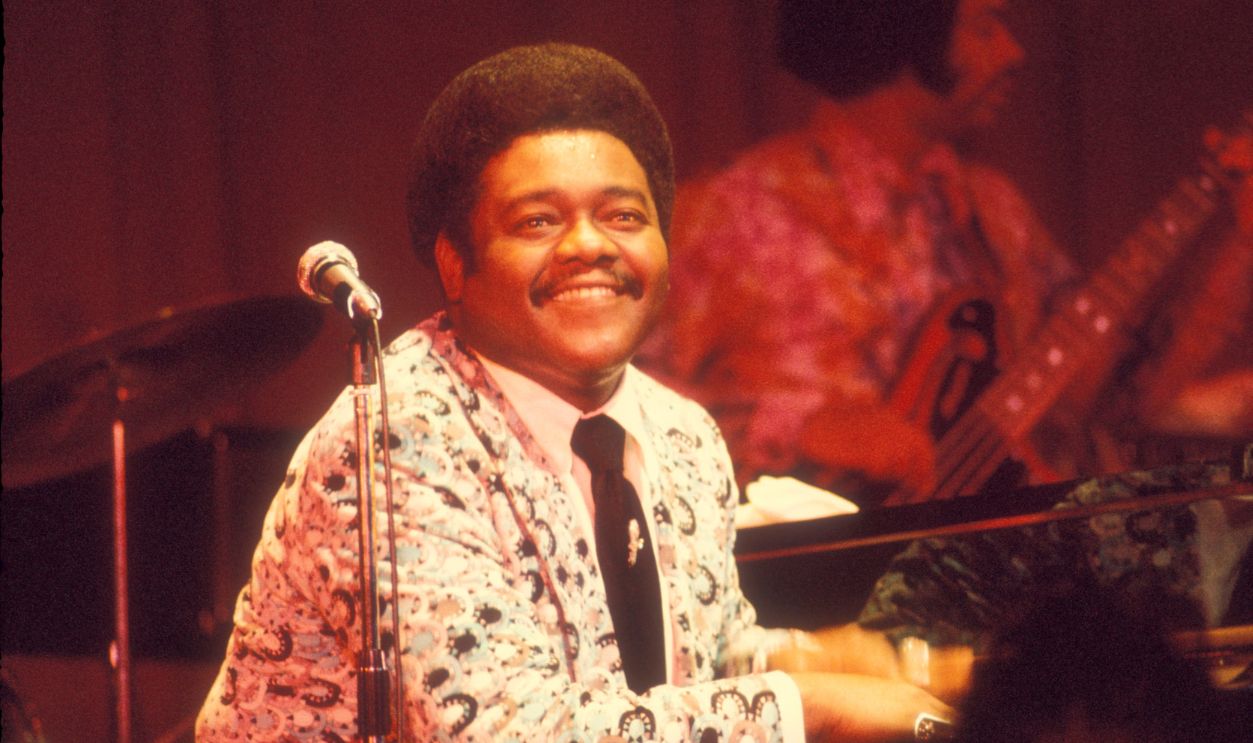 Fats Domino (1928-2017), American singer-songwriter, pianist and bandleader, during a concert, June 12, 1974. 