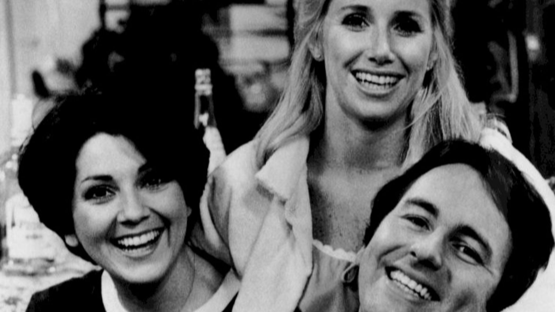 Publicity photo of the roommates from the television program Three's Company.  From left: Joyce DeWitt (Janet}, Suzanne Sommers (Chrissy), John Ritter (Jack).