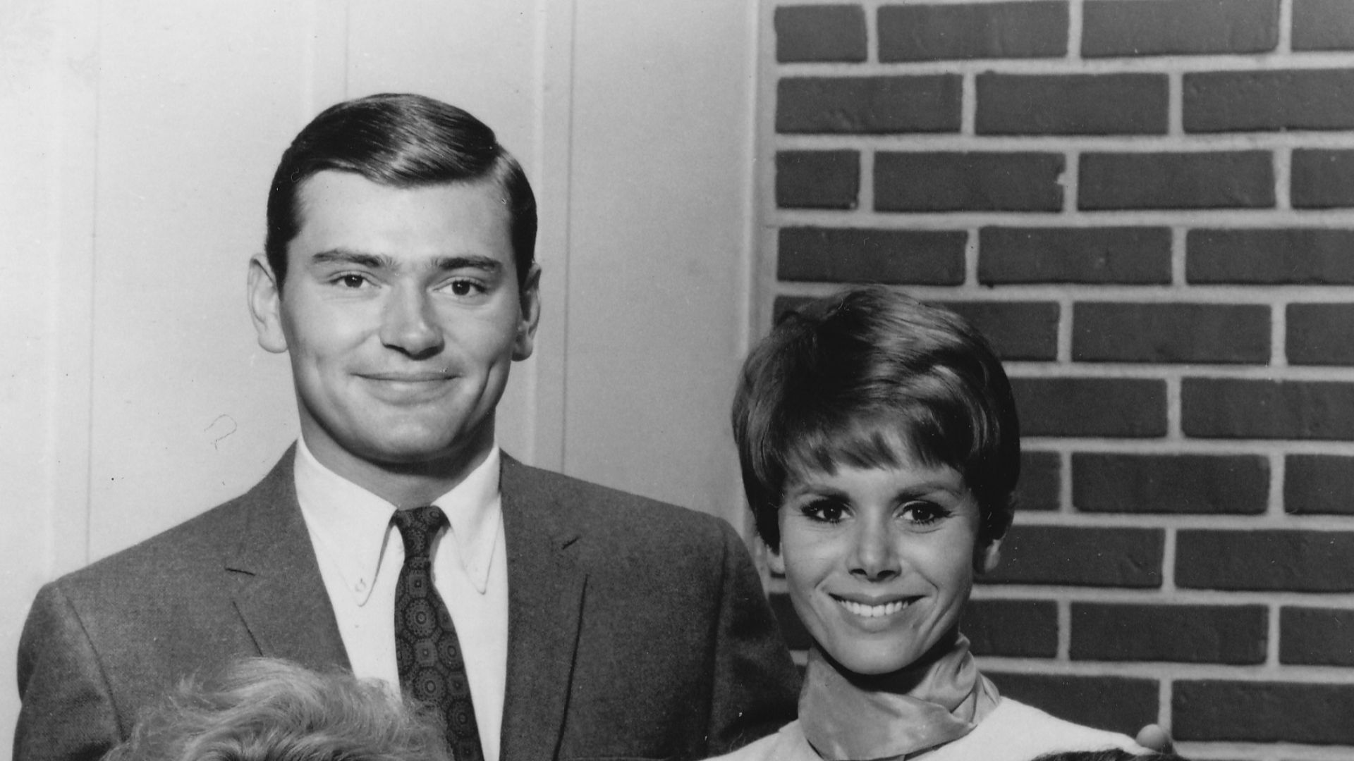 Publicity photo of the cast of the ABC television series Love on a Rooftop; (Top, L–R) Peter Deuel, Judy Carne, (Front, L–R) Edith Atwater, Herbert Voland.