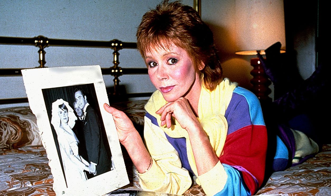 Actress and former wife to Actor Burt Reynolds (1963-1965) displays their wedding images in Atlanta, Georgia Circa 1980 