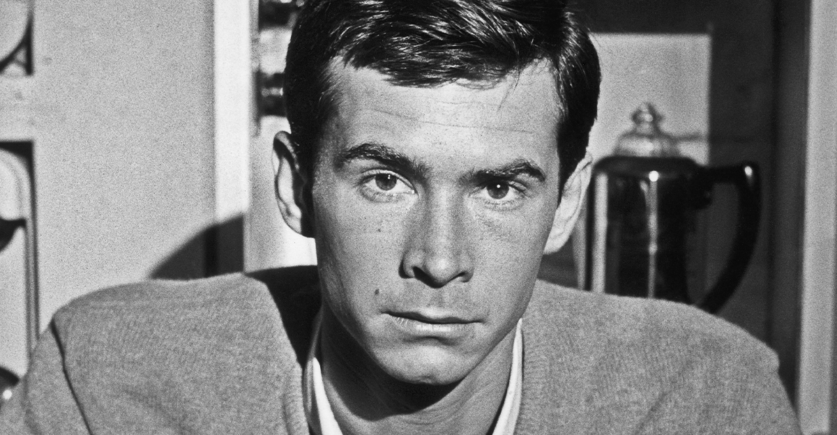 Photo of Anthony Perkins, looking serious.