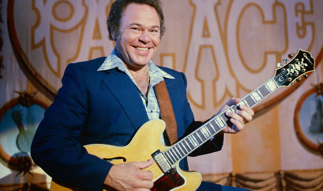 American singer & musician Roy Clark, performing on stage at the Nashville Palace, in Nashville, TN on September 16, 1981