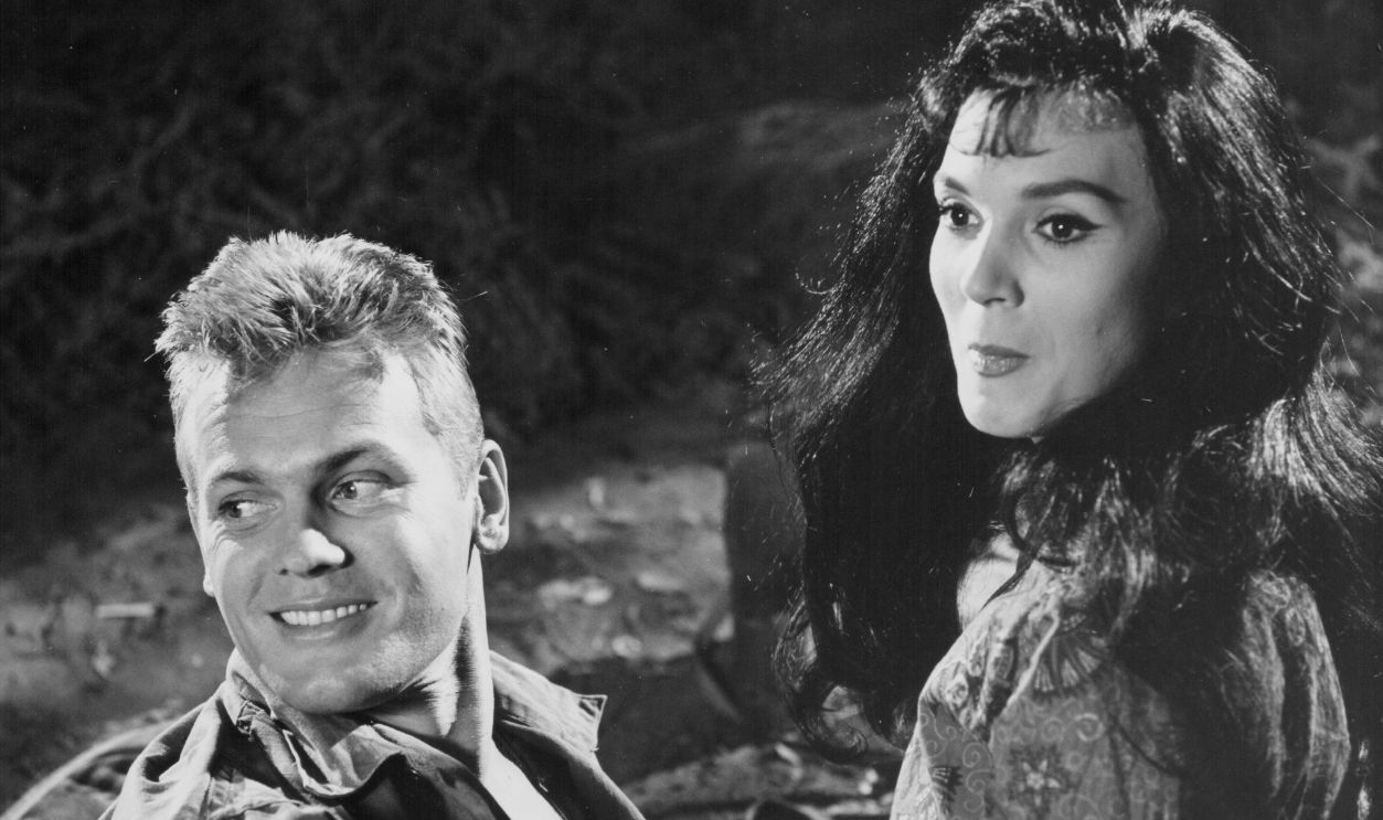 Actors Tab Hunter and Eva Six in a scene from the movie 'Operation Bikini', 1963.