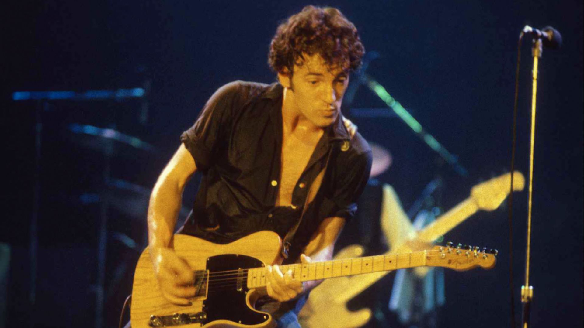 American rock musician Bruce Springsteen performing at the New Haven Coliseum in 	New Haven, Connecticut circa 1977-1978