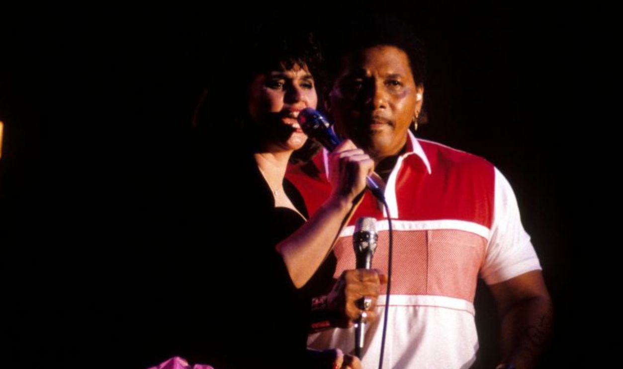 UNITED STATES - MAY 01: NEW ORLEANS JAZZ FESTIVAL Photo of NEVILLE BROTHERS and Aaron NEVILLE and Linda RONSTADT, with Aaron Neville 