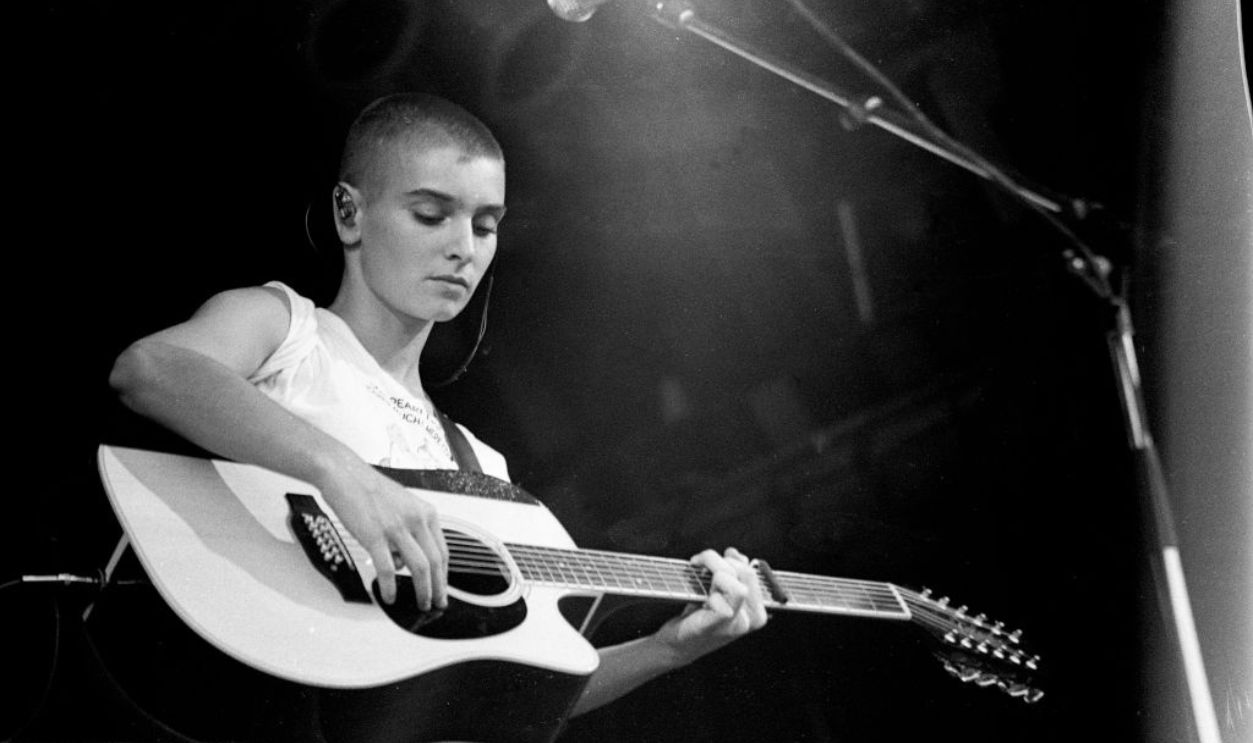 Sinead O'Connor performs on stage at Glastonbury , United Kingdom, 1990.