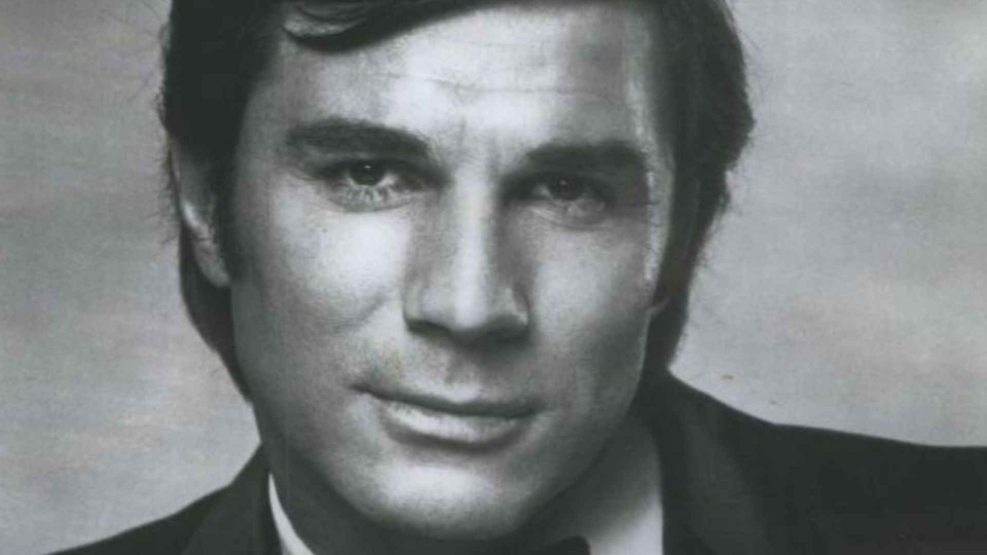 Publicity photograph of George Maharis, taken on or before 1972, proven by another copy. According to the back of one of copies, the play Steambath was supposed to be performed live in Forum Theatre in Summit on Tuesday, April 29, 1975; Maharis was suppos